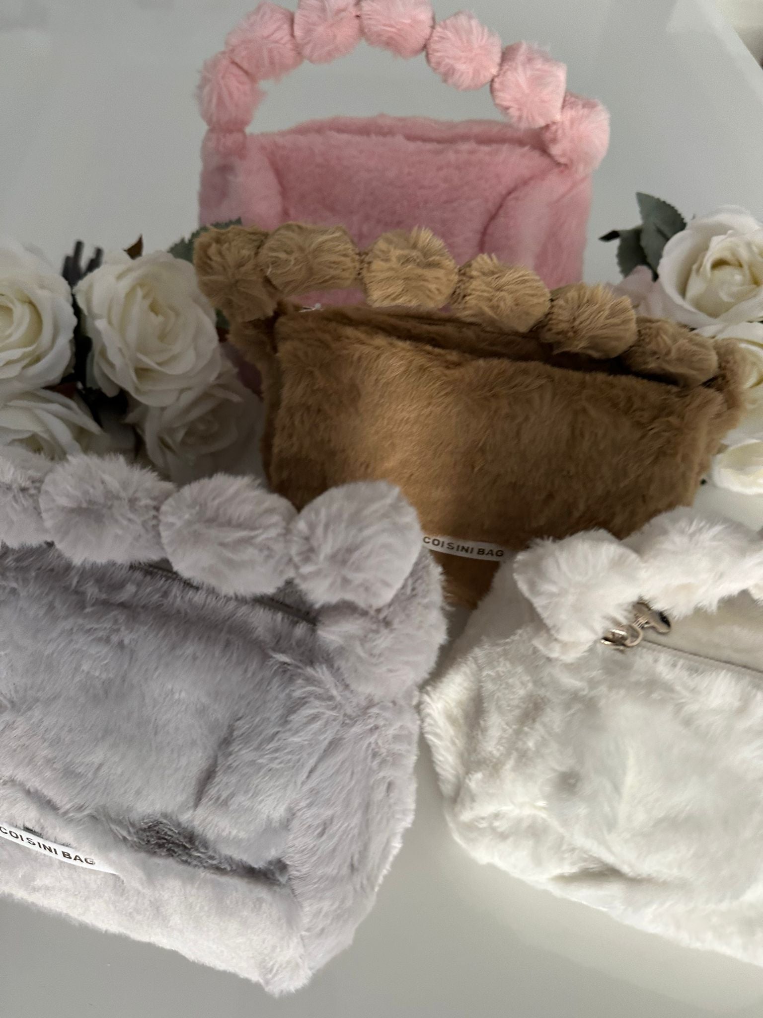Pochette in peluche - Vari Colori